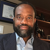 man with a beard wearing a business suit